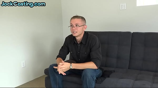 Gay dude gets naked and starts masturbating on the couch