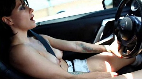 Belladonna masturbating while driving a car