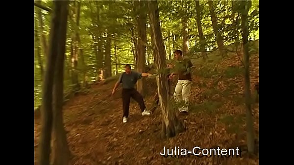 Beautiful busty Blonde takes on two cocks in the forest - German 80s retro